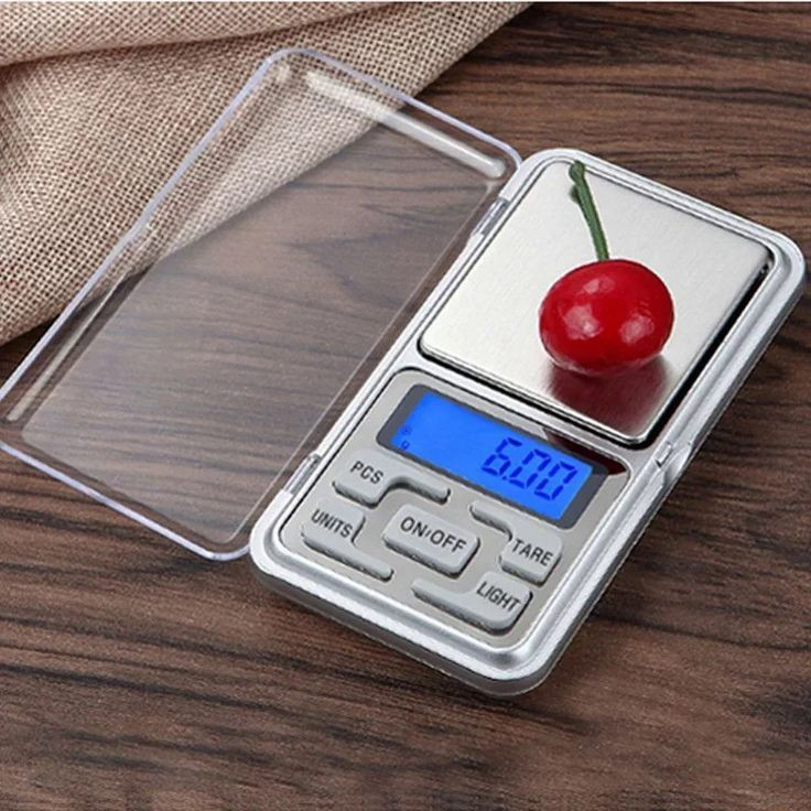 ترازو دیجیتال گرم کش و سوت کش طلا نقره زعفران و...0.01 گرم و تحمل وزن تا 500 گرم